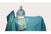 a surgeon using BARRIER laparoscopy drapes