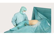 a surgeon using a BARRIER Orthopaedic drape 