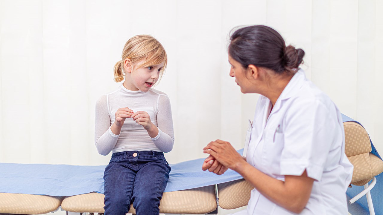 nurse talking with girl